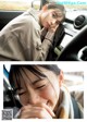 A young girl sitting in the driver's seat of a car.